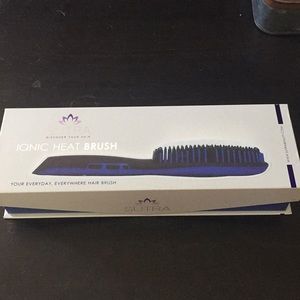 Sutra heating brush